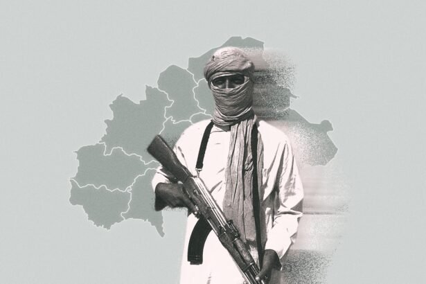 A masked armed militant in traditional Sahelian clothing holds a rifle in front of a map outline of Burkina Faso, symbolizing jihadist presence in the region.