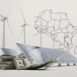 A large solar farm in an African desert with transmission lines leading toward a distant city skyline, symbolising Gulf‑backed clean energy investment trying to close Africa’s $133 billion annual funding gap