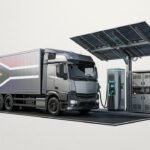 A solar-powered fast-charging station for heavy-duty electric trucks along South Africa’s N3 highway, showing rows of solar panels and technicians overseeing a truck charge.