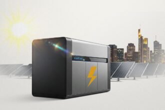 Attendees walking past solar panels and battery racks at an energy exhibition in Johannesburgs Gallagher Convention Centre